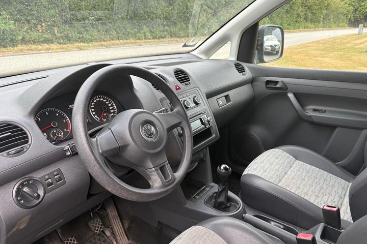 Gul VW Caddy fra 2012