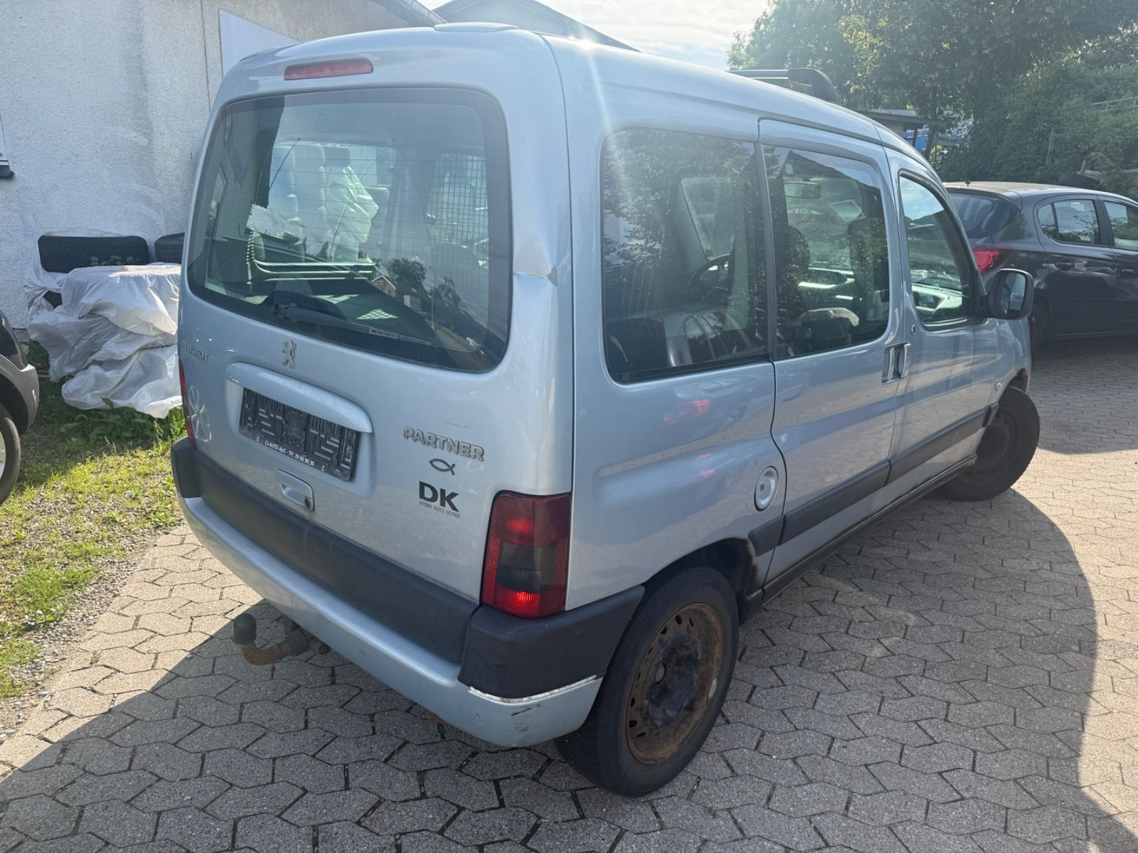 Sølv Peugeot Partner fra 2003