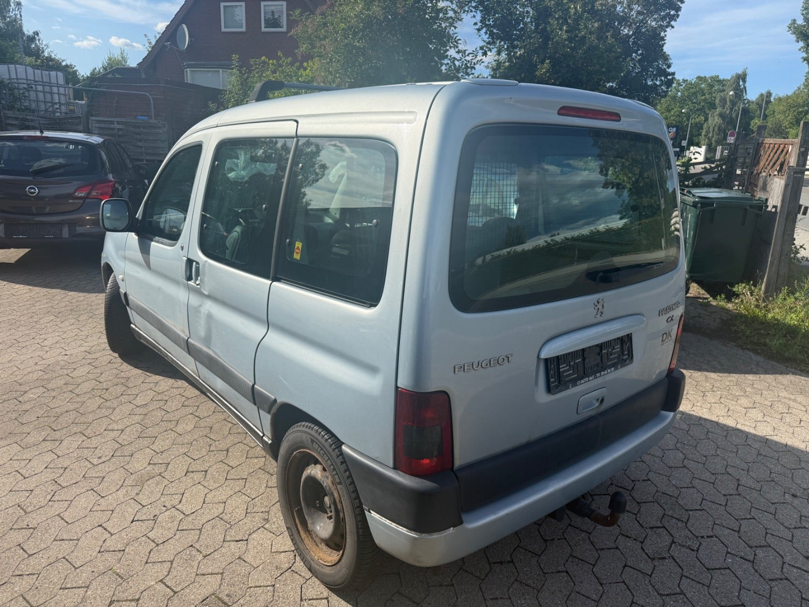 Sølv Peugeot Partner fra 2003