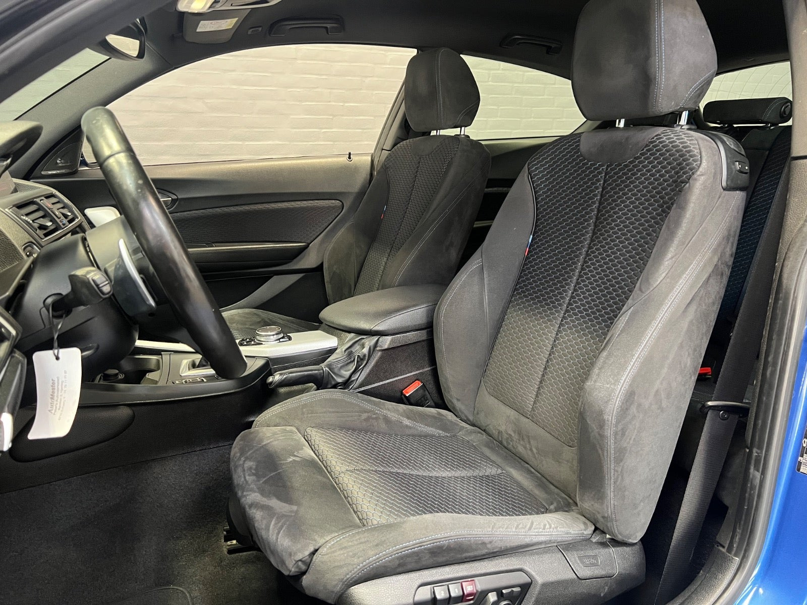 Blå BMW M135i fra 2015