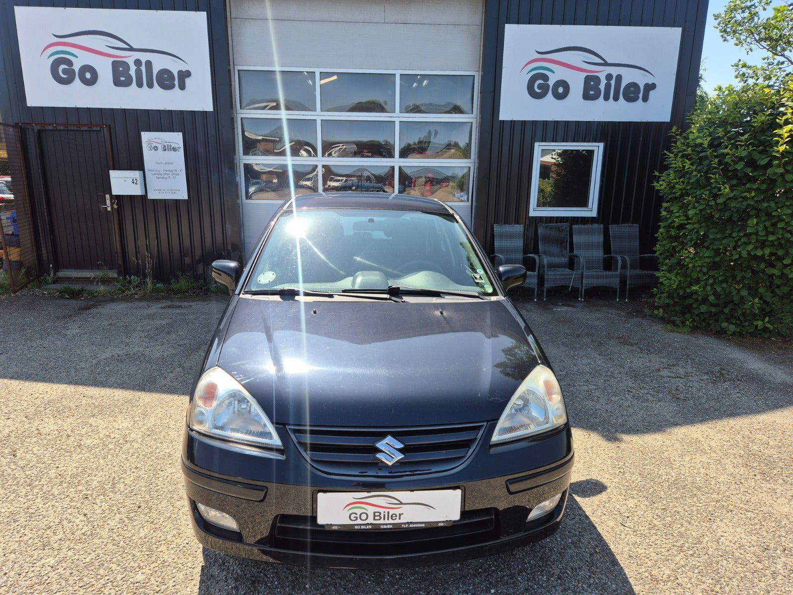 Grøn Suzuki Liana fra 2006