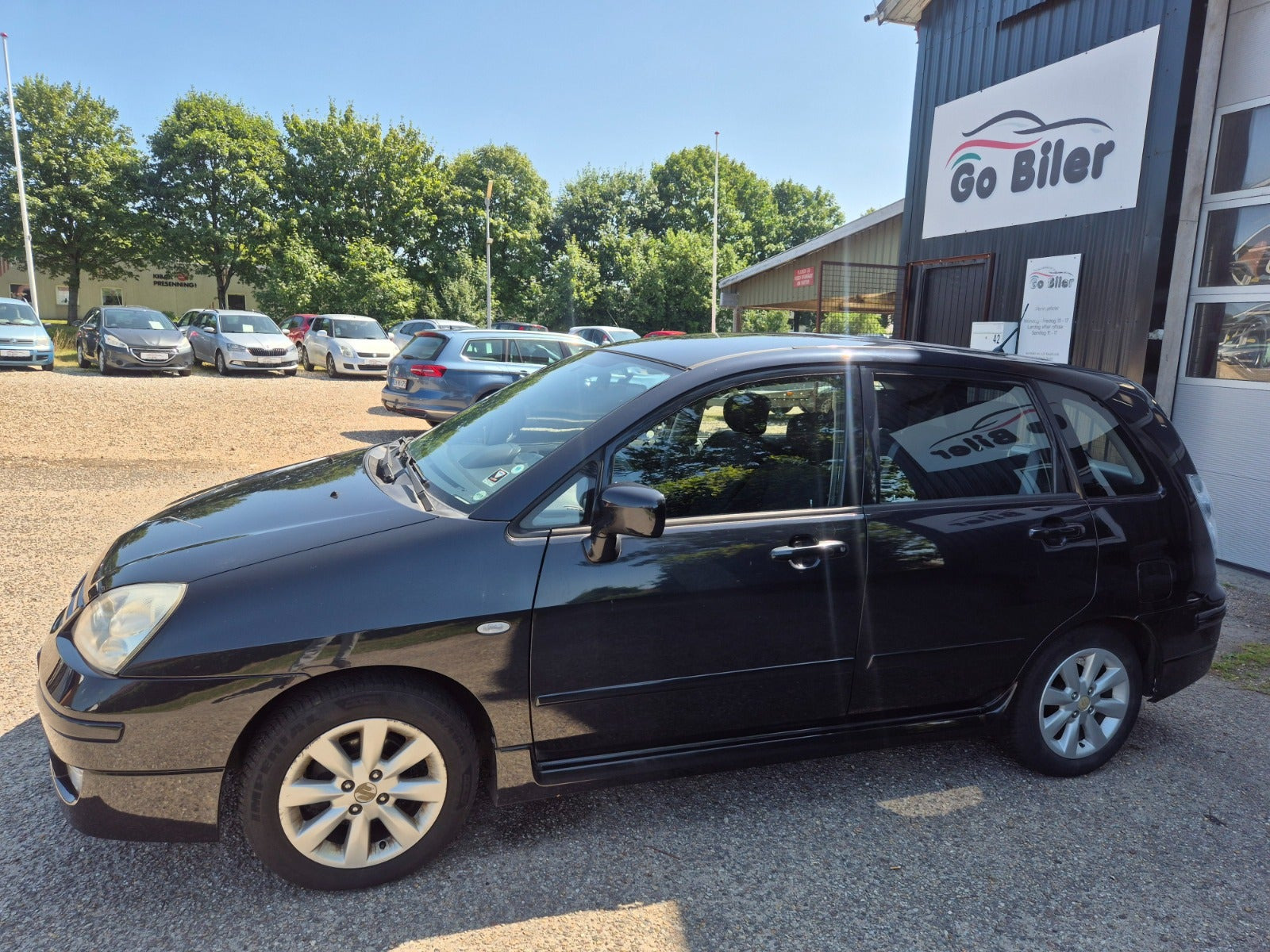 Grøn Suzuki Liana fra 2006