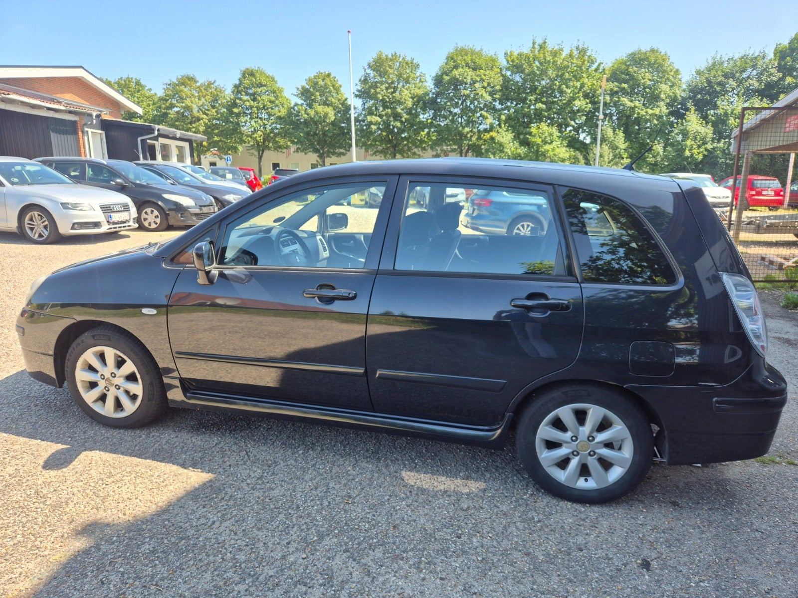 Grøn Suzuki Liana fra 2006