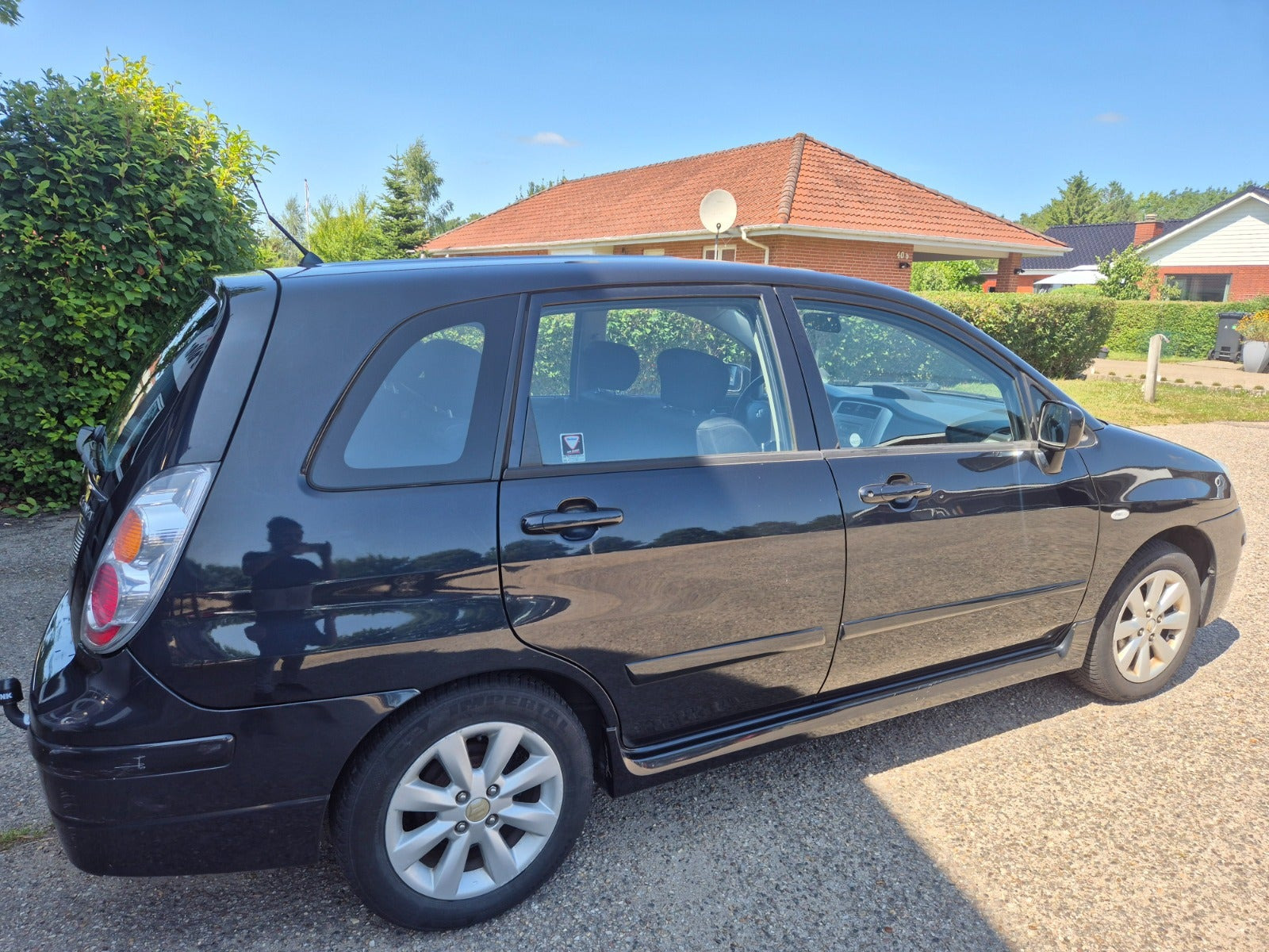 Grøn Suzuki Liana fra 2006