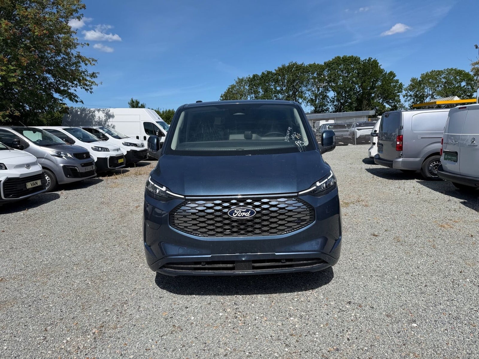 Blå Ford E-Transit Custom 320 L1 fra 2026