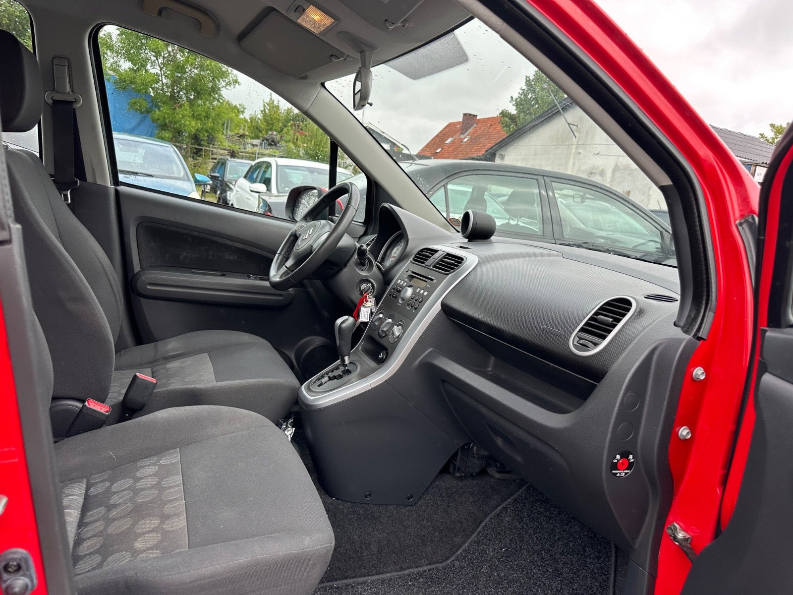 Rød Suzuki Splash fra 2010