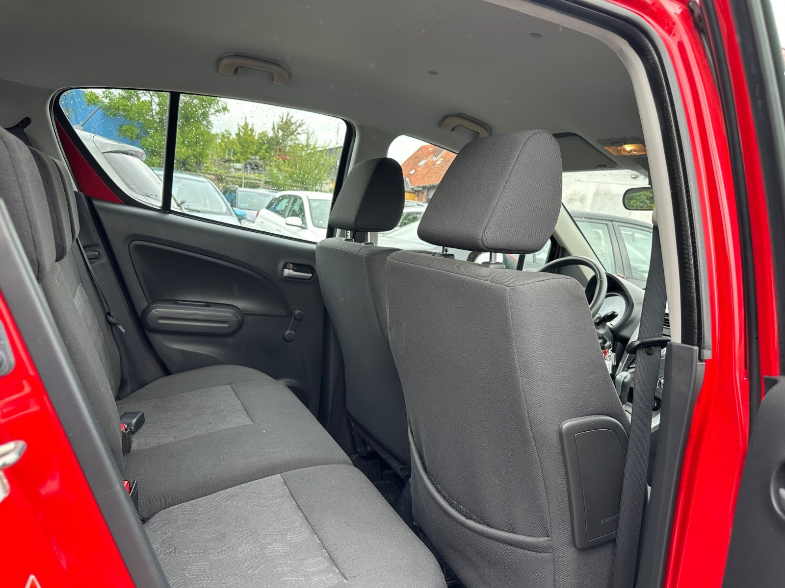 Rød Suzuki Splash fra 2010