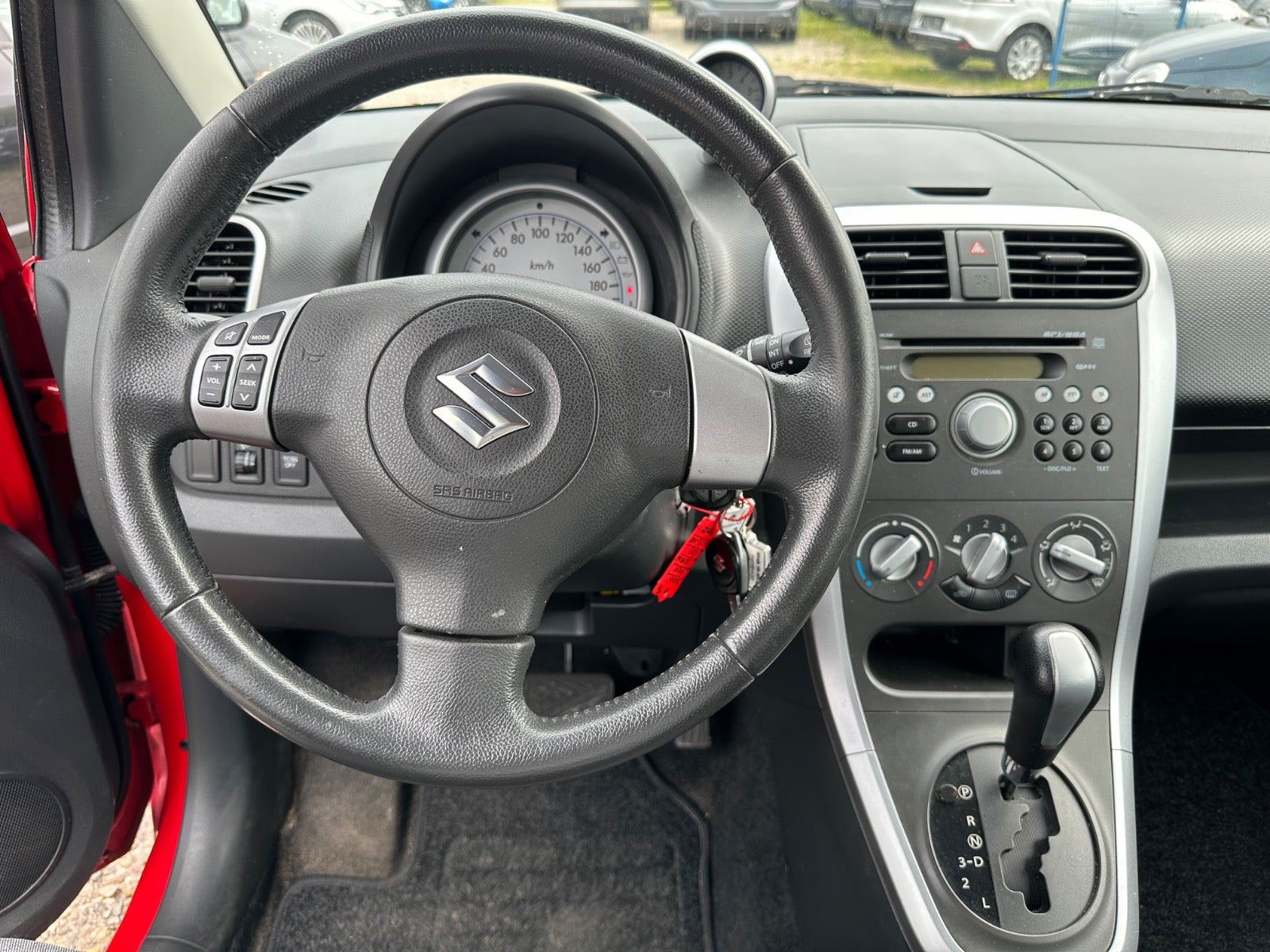 Rød Suzuki Splash fra 2010