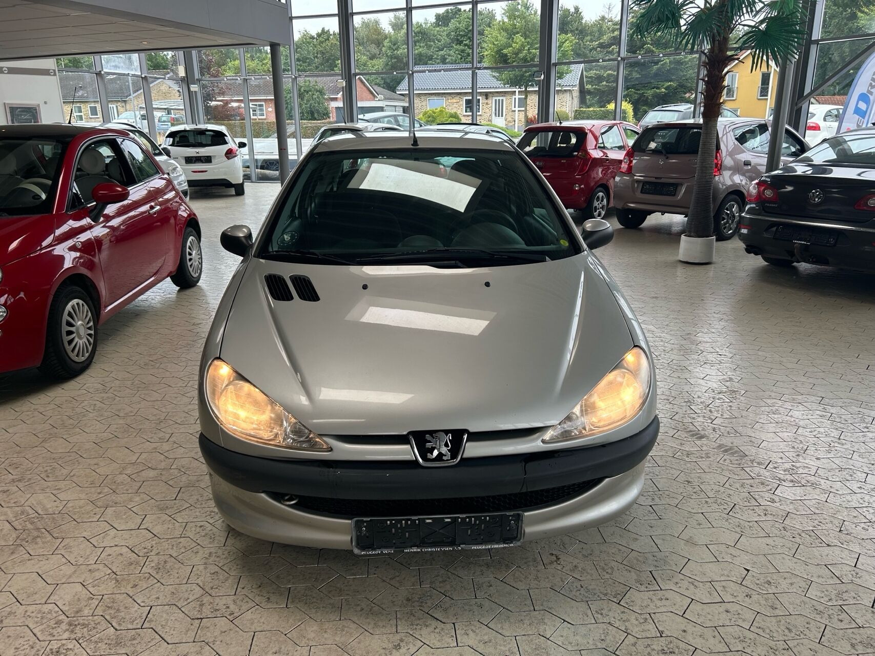 Sølv Peugeot 206 fra 2004