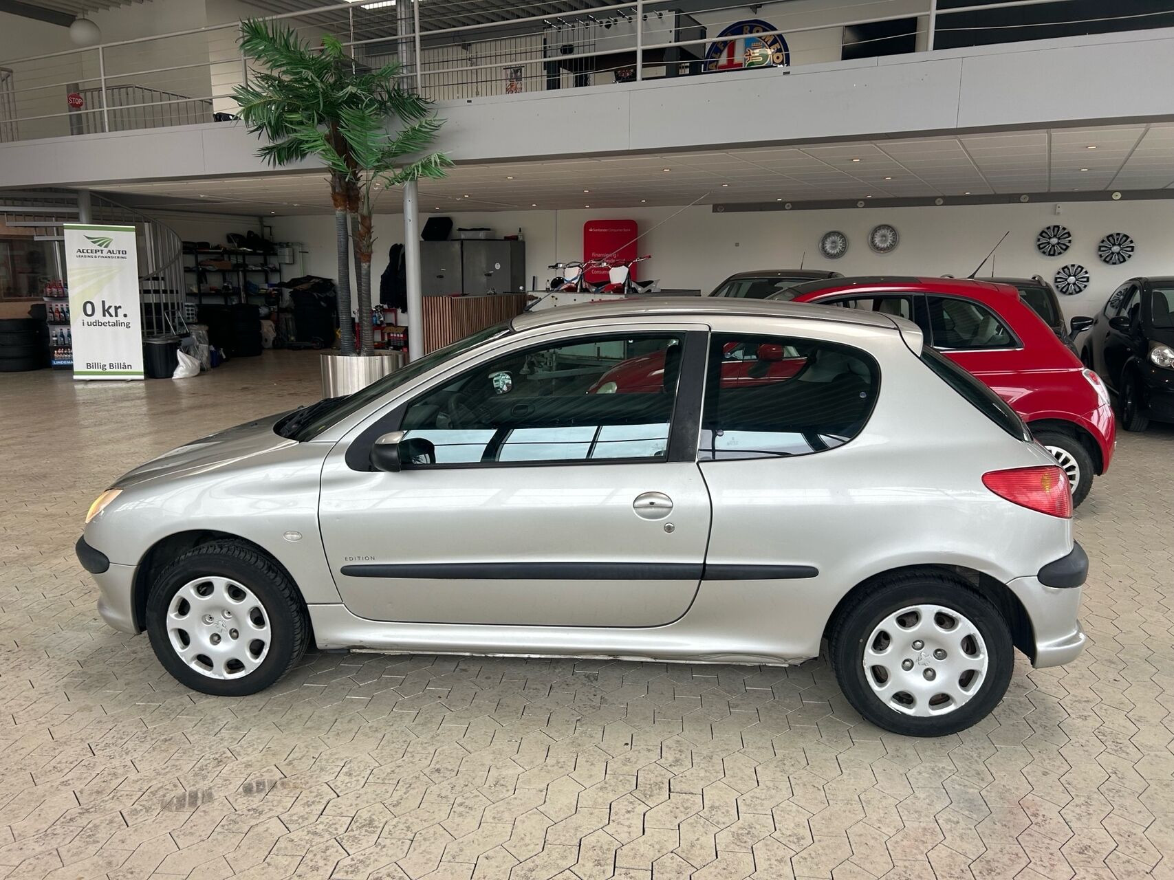 Sølv Peugeot 206 fra 2004
