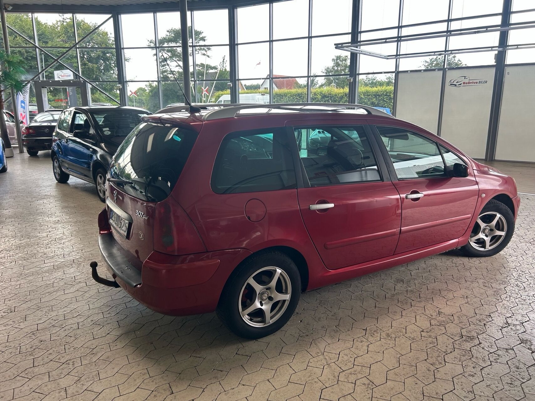 Rød Peugeot 307 fra 2004
