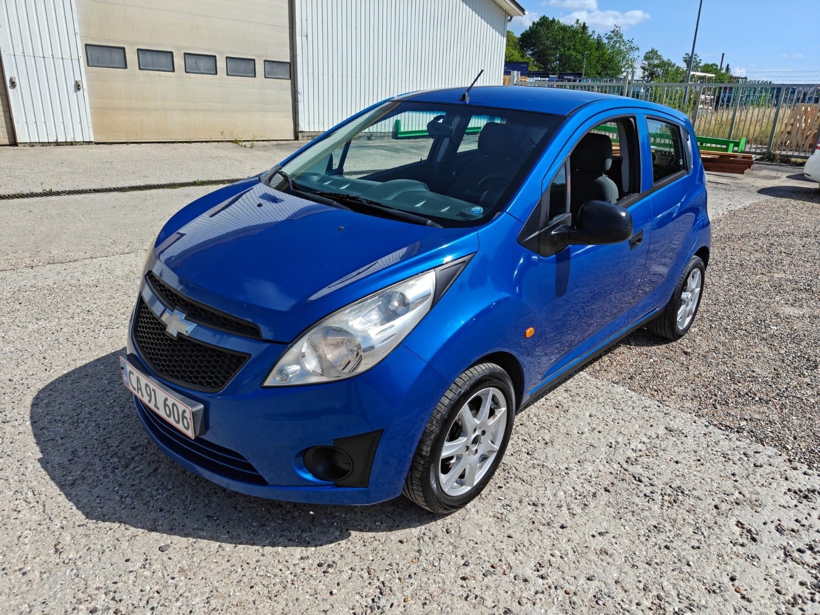 Gul Chevrolet Spark fra 2010