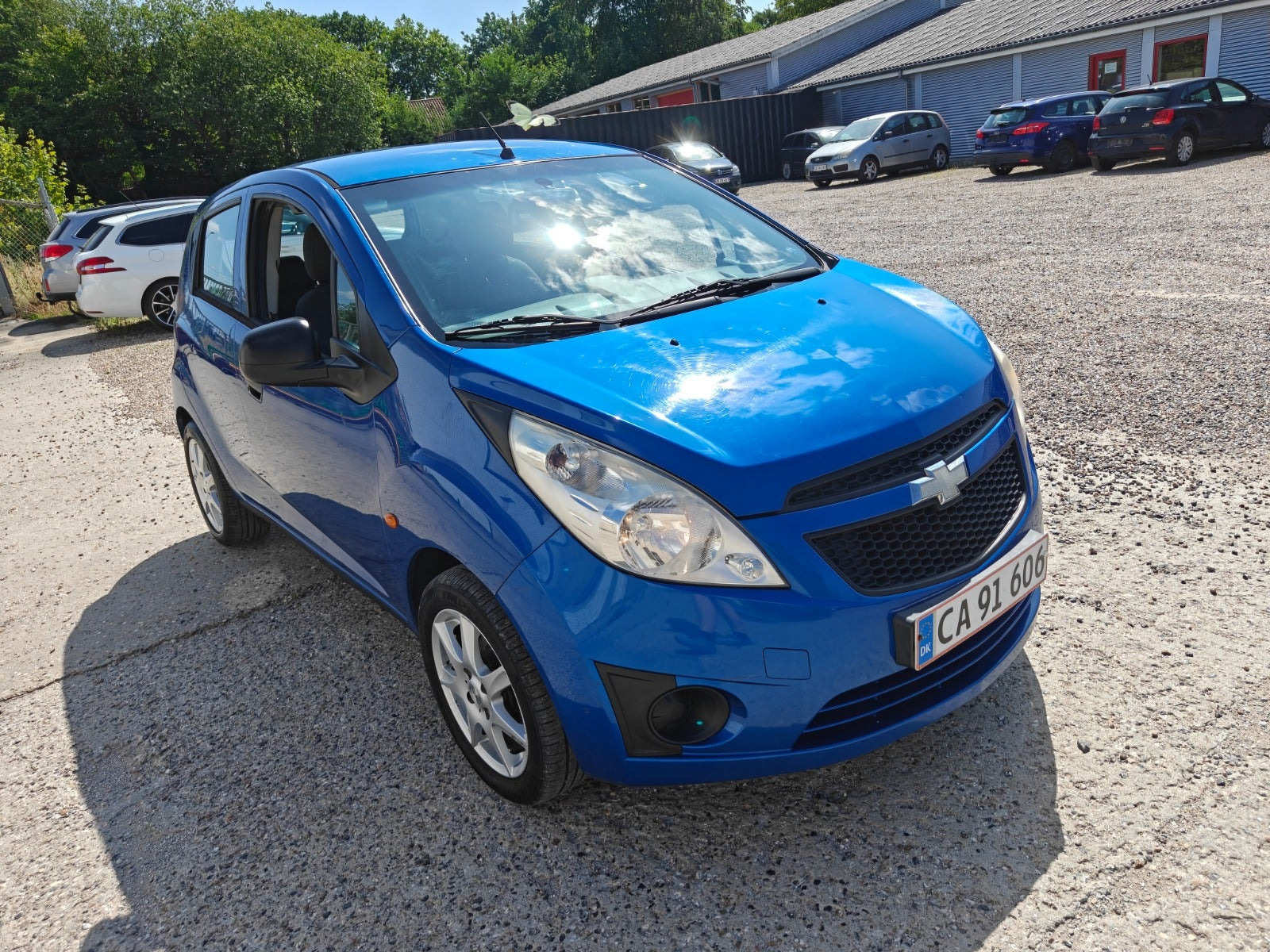 Gul Chevrolet Spark fra 2010