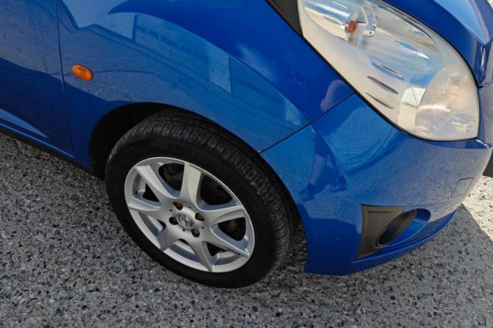 Gul Chevrolet Spark fra 2010