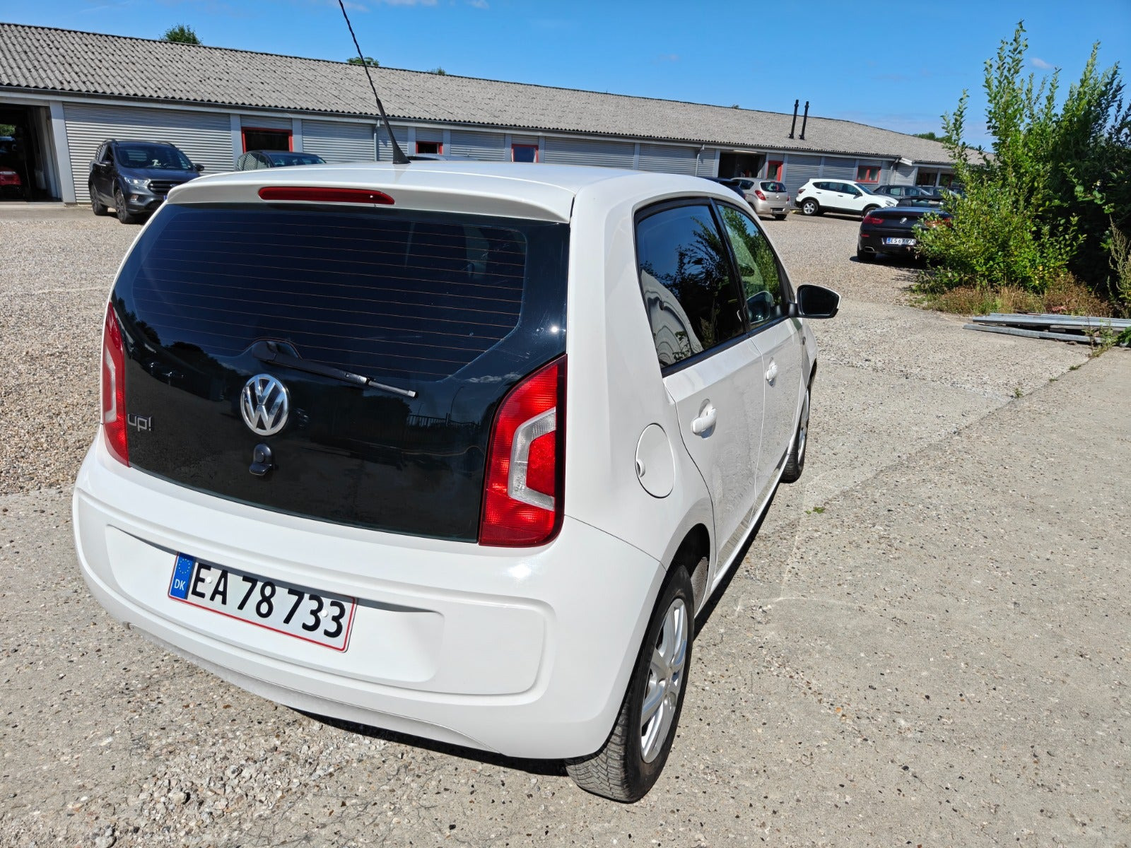 Gul VW UP! fra 2013