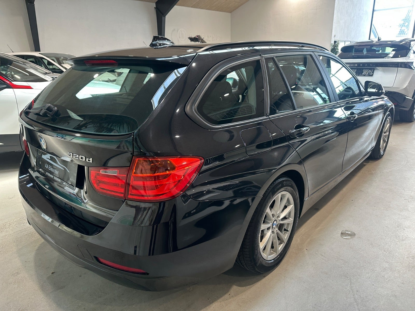 Sort BMW 320d fra 2013
