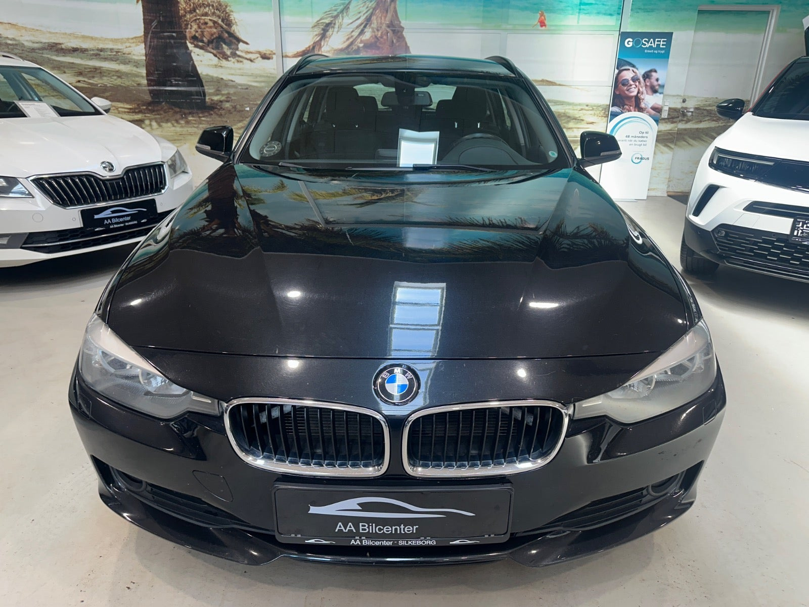 Sort BMW 320d fra 2013