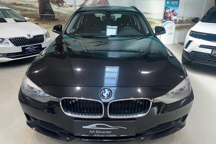 Sort BMW 320d fra 2013
