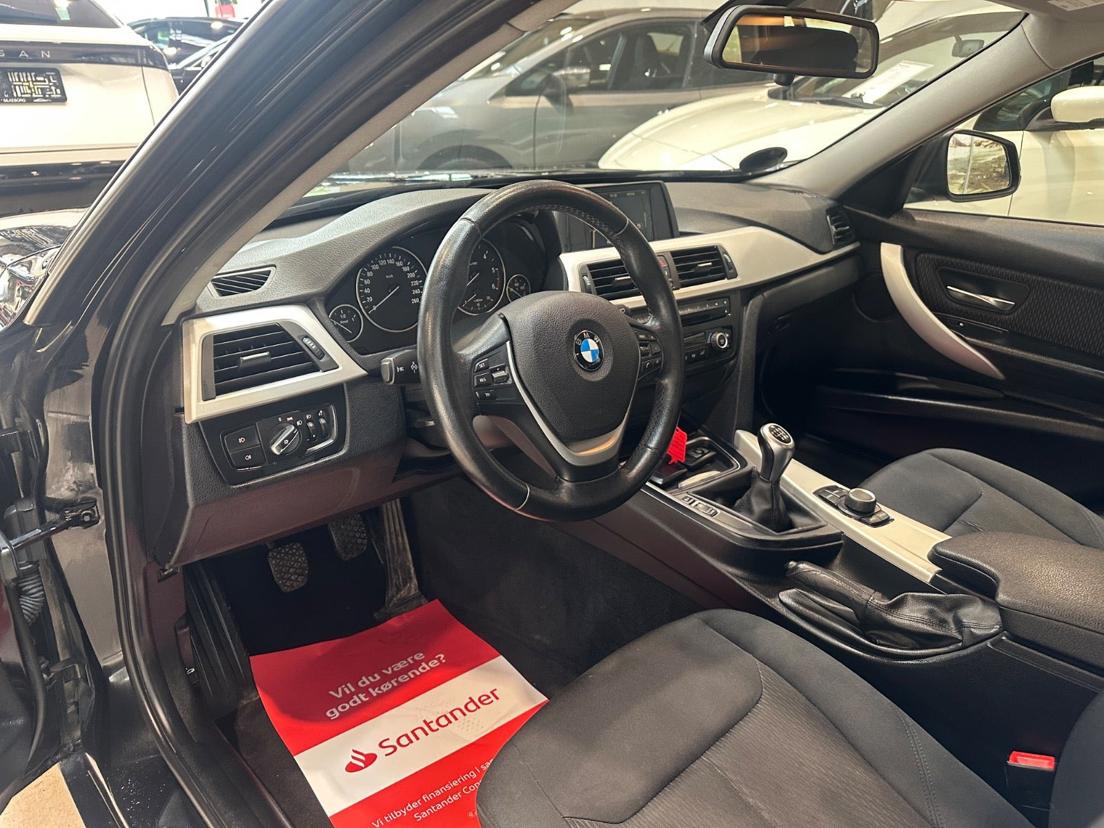 Sort BMW 320d fra 2013
