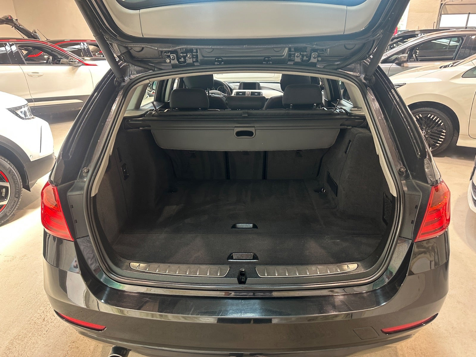Sort BMW 320d fra 2013