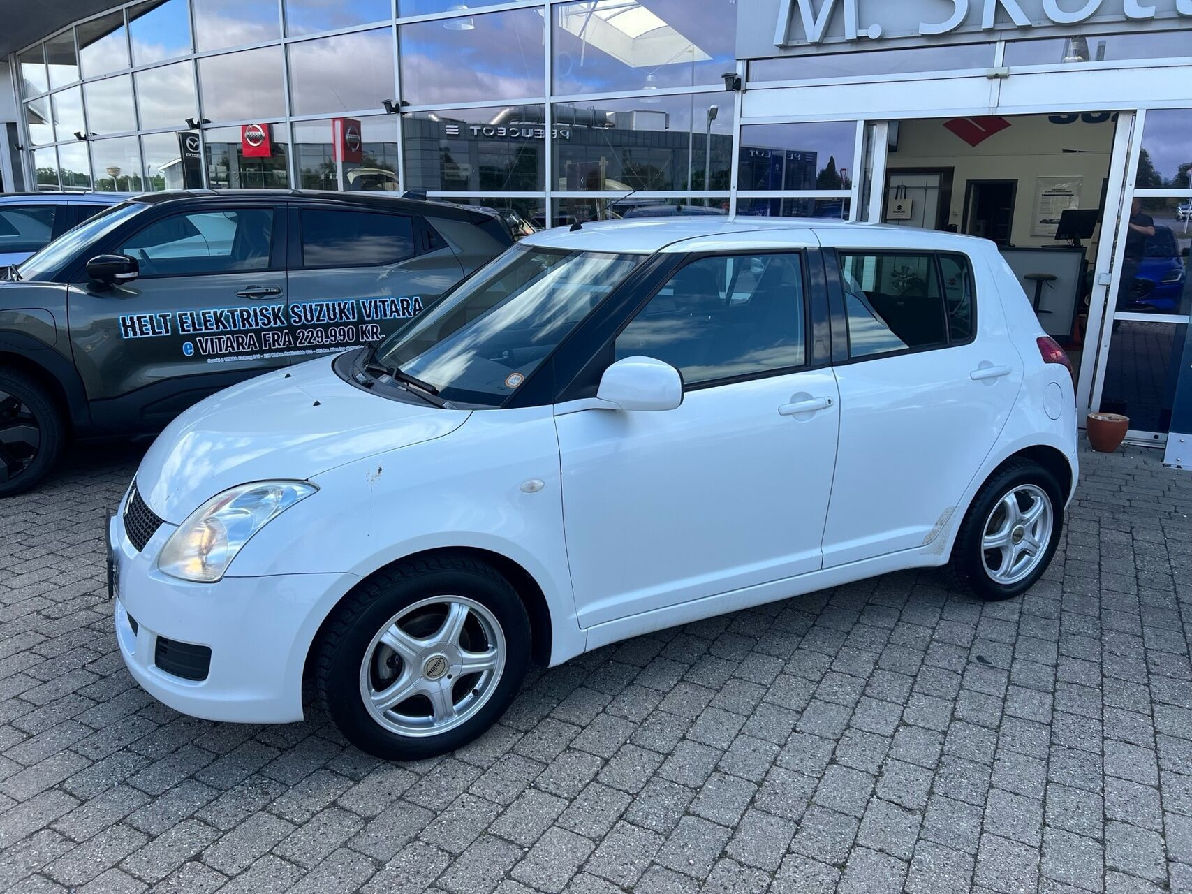 Hvid Suzuki Swift fra 2009