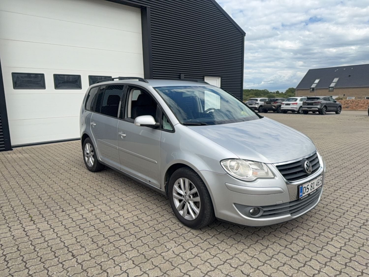 Sølv VW Touran fra 2006