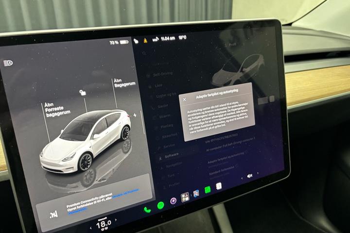 Hvid Tesla Model Y fra 2024