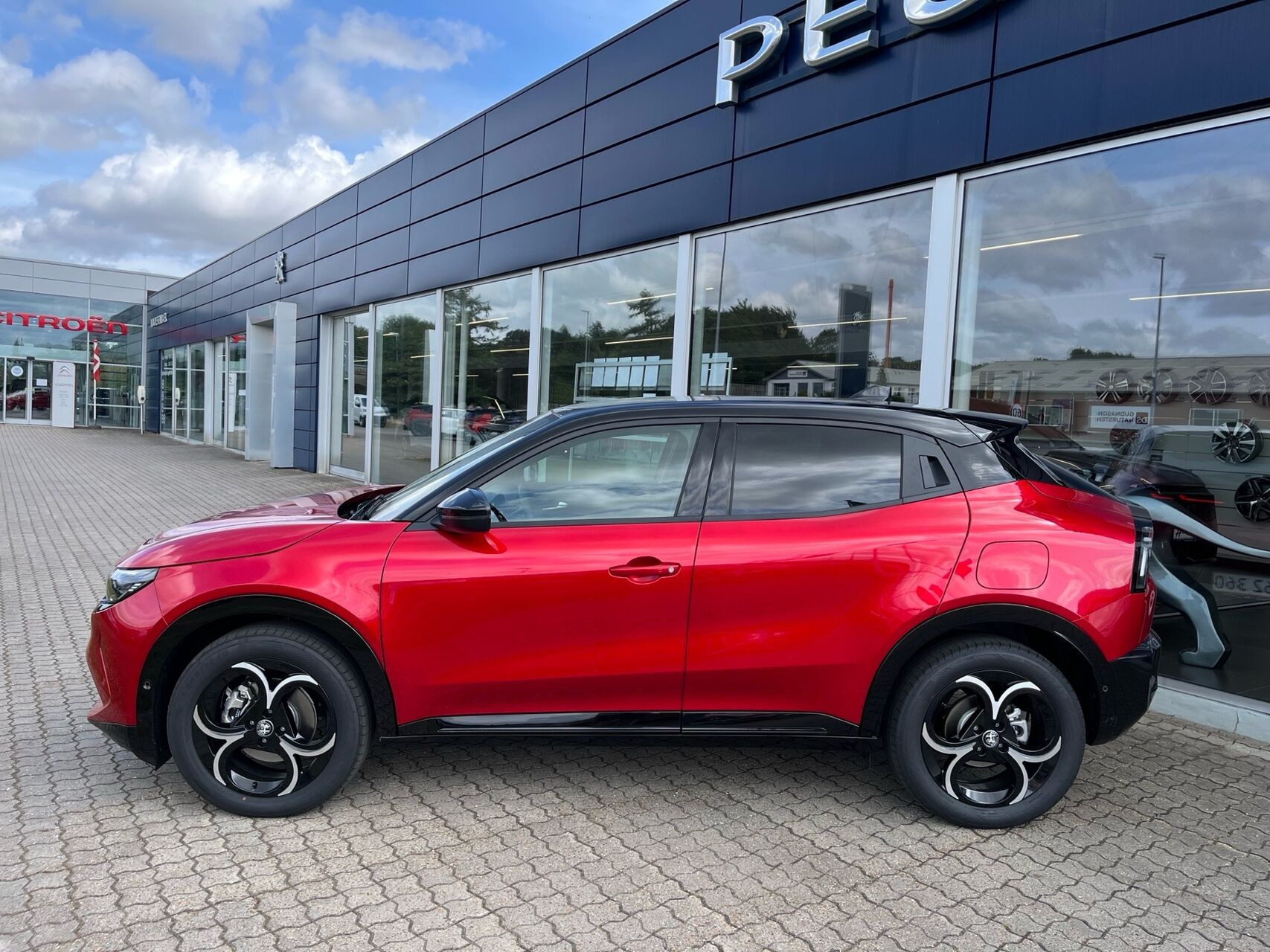 Rød Alfa Romeo Junior fra 2026
