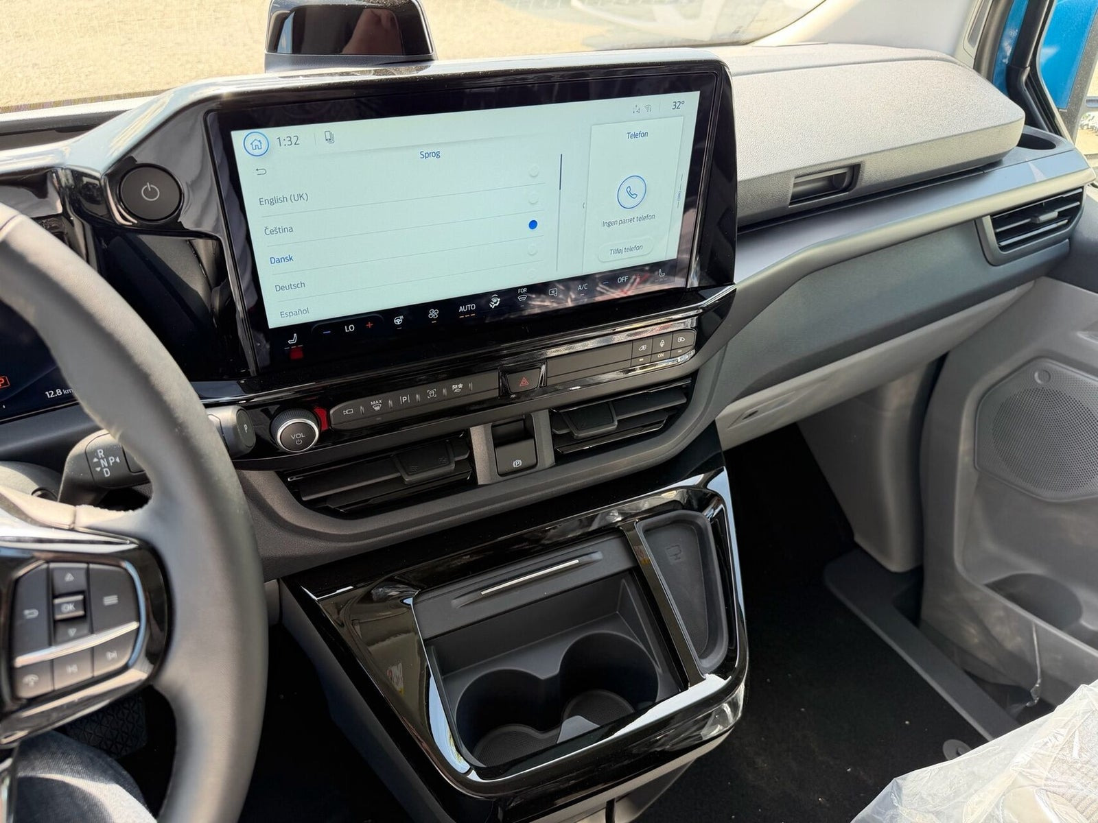 Blå Ford E-Transit Custom 320 L1 fra 2026
