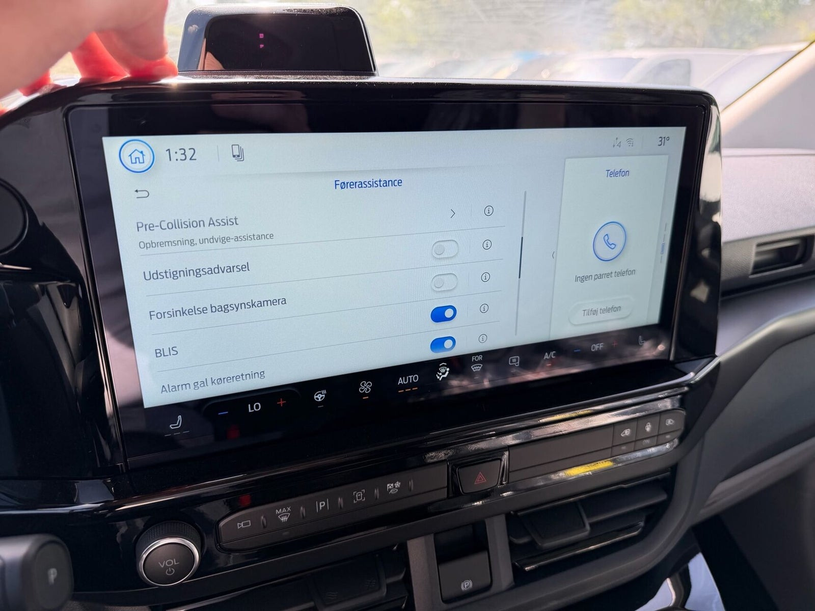 Blå Ford E-Transit Custom 320 L1 fra 2026