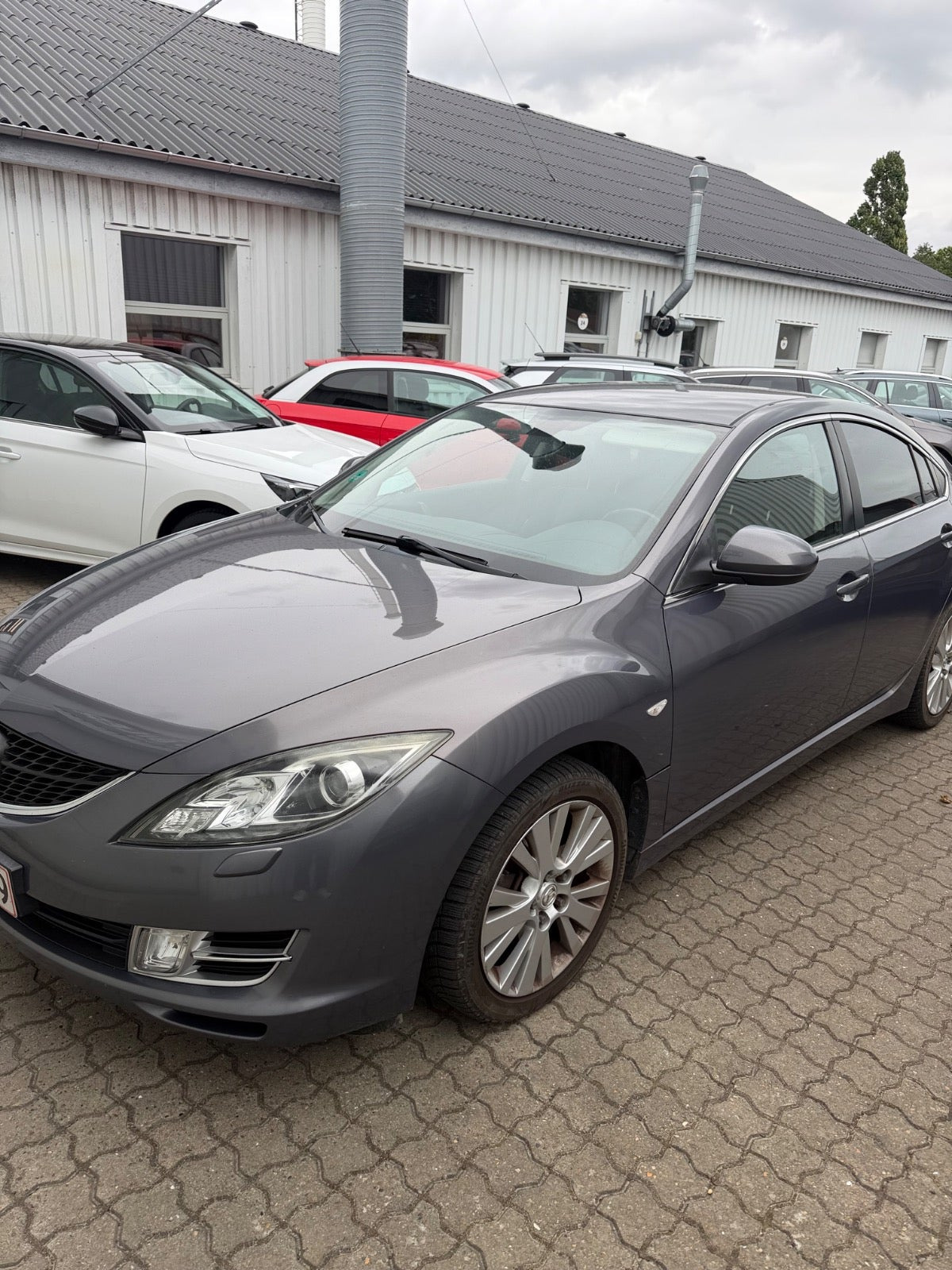 Grå Mazda 6 fra 2010