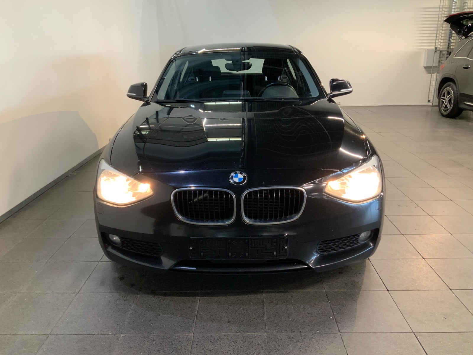 Sort BMW 118d fra 2014