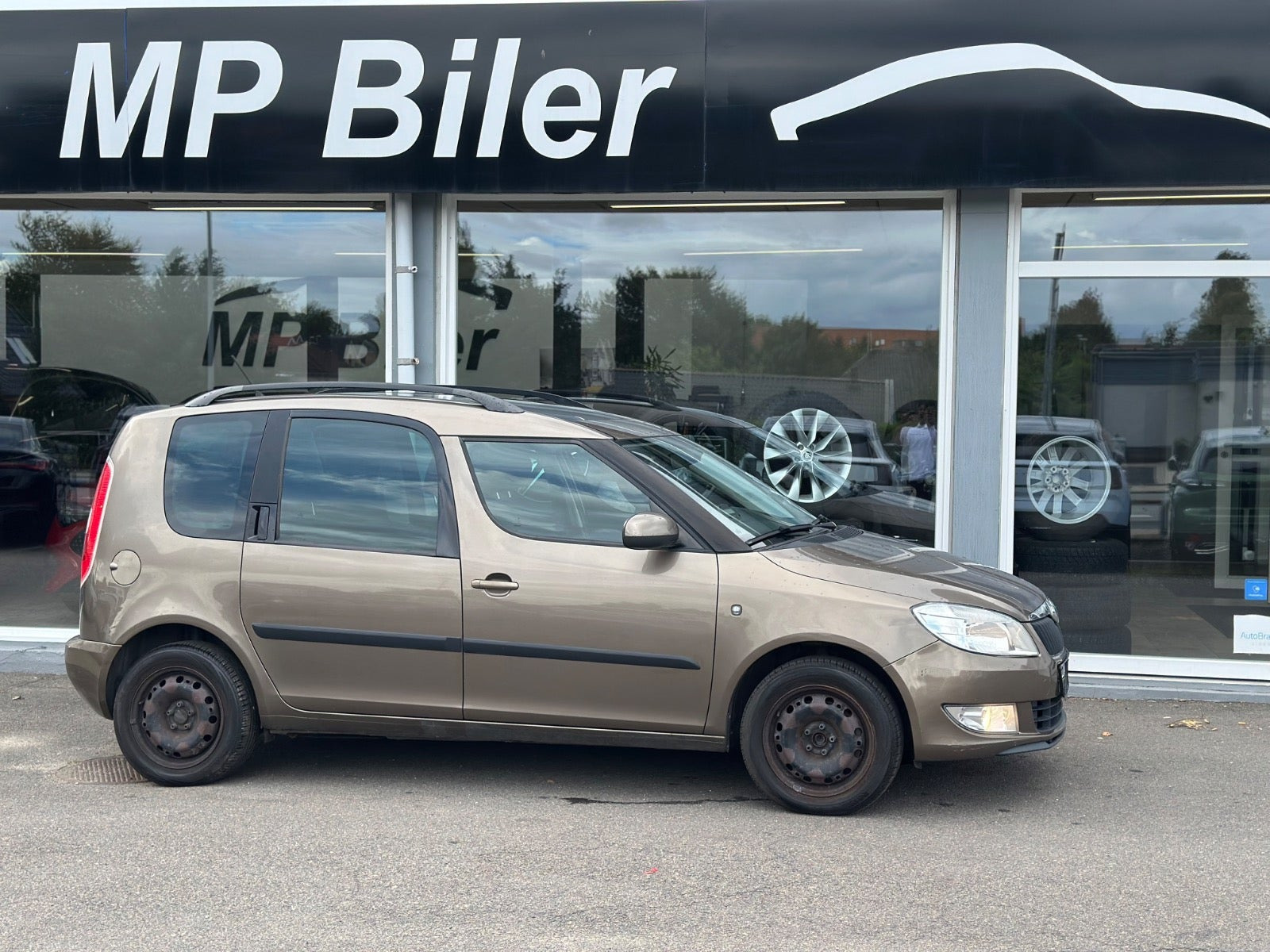 Beige Skoda Roomster fra 2012