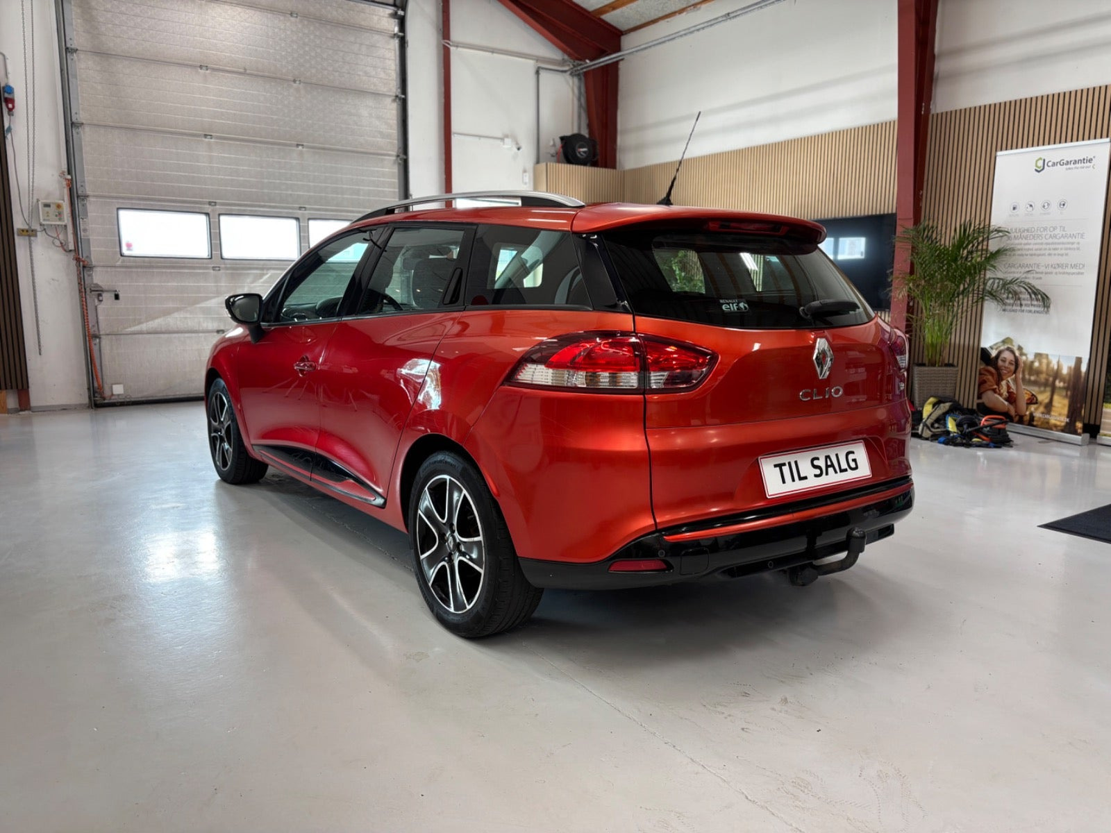 Rød Renault Clio IV fra 2014