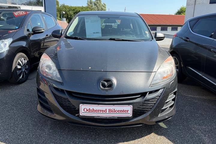 Grå Mazda 3 fra 2010