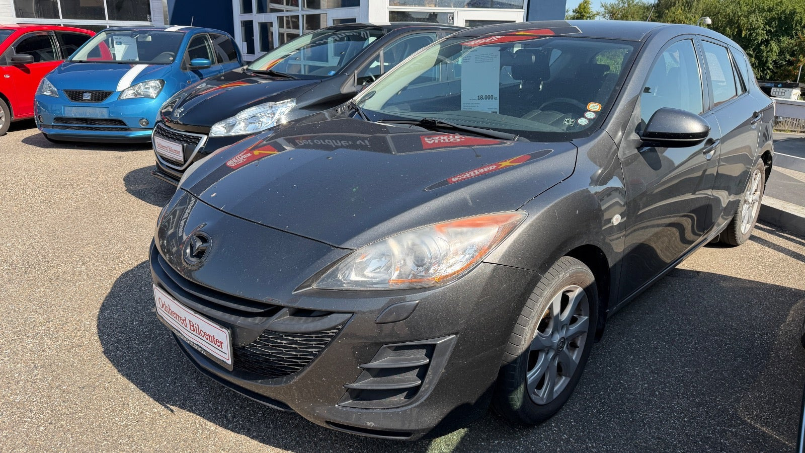 Grå Mazda 3 fra 2010