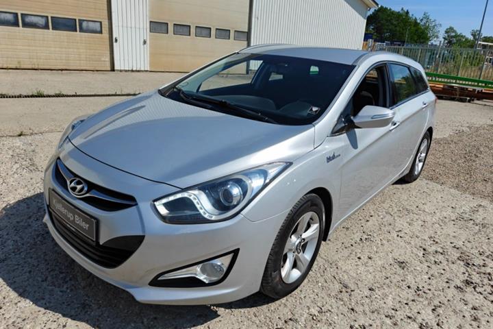 Gul Hyundai i40 fra 2012
