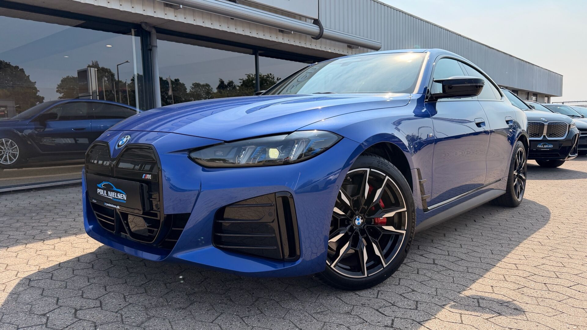 Blå BMW i4 fra 2024