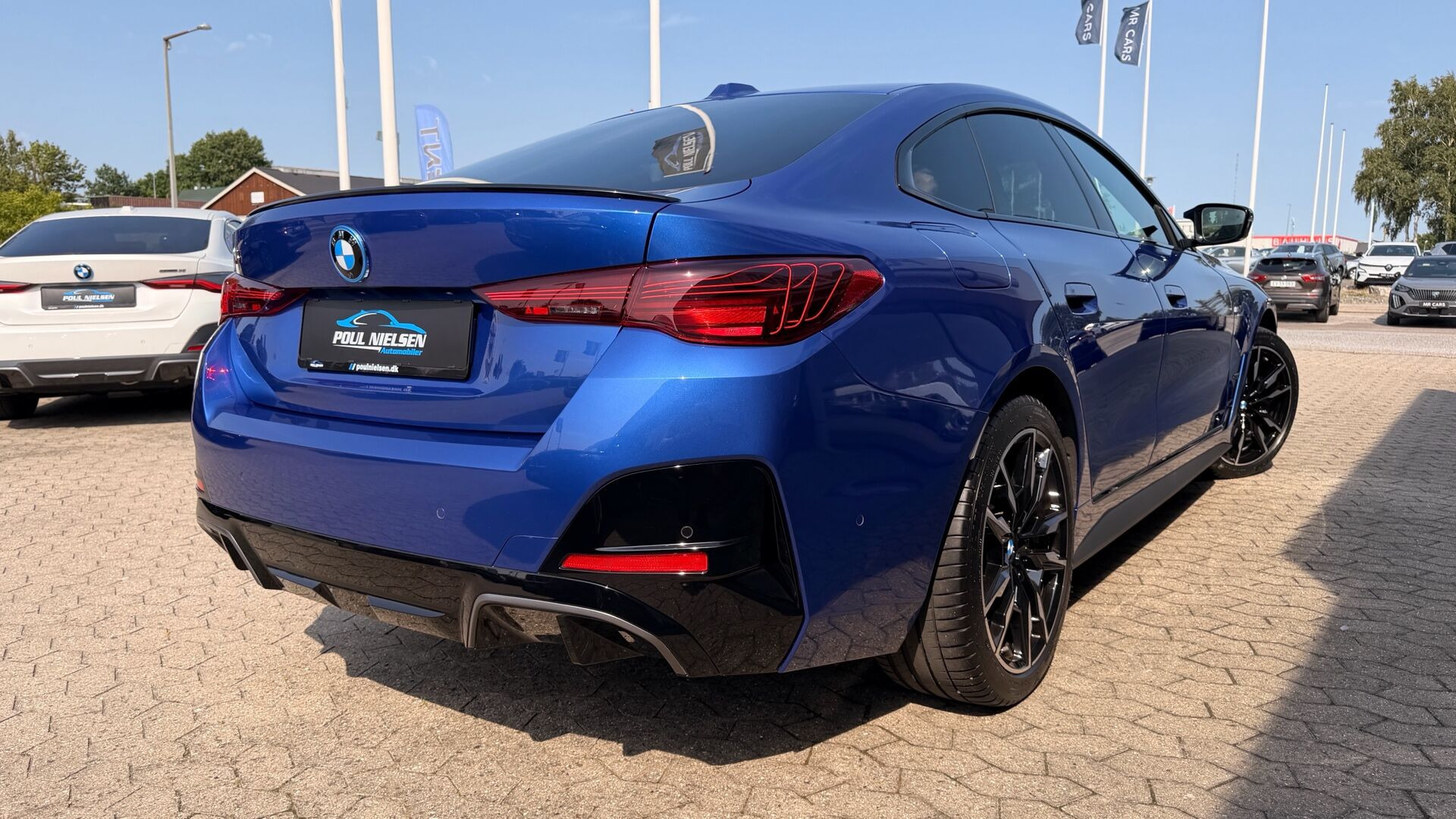 Blå BMW i4 fra 2024