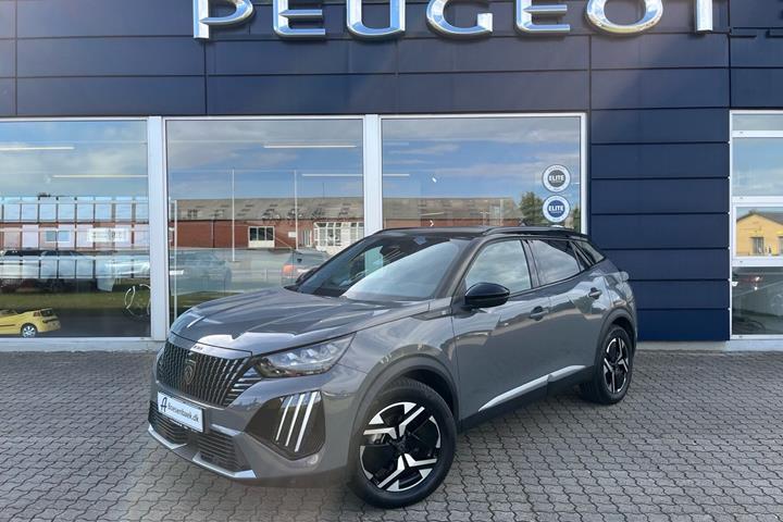Grå Peugeot e-2008 fra 2025 set udefra