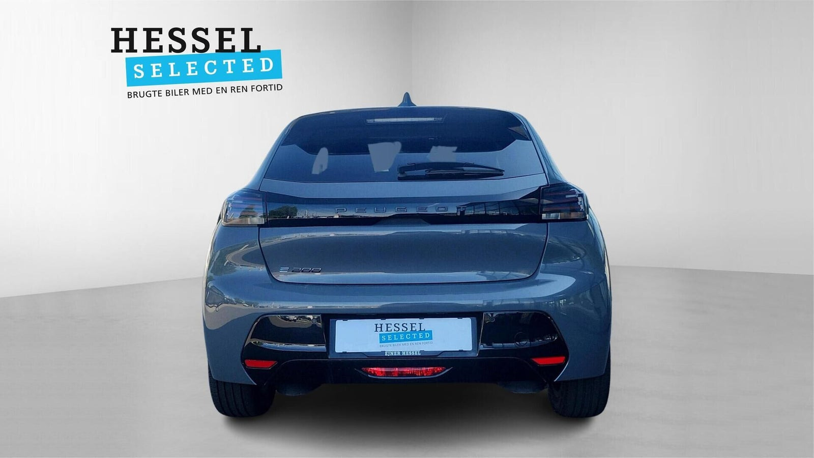 Grå Peugeot e-208 fra 2025