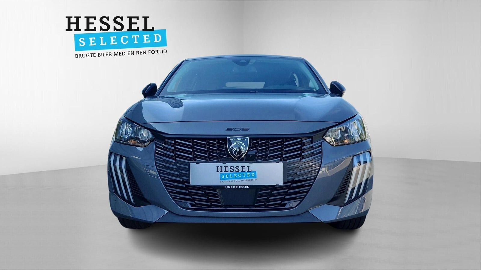 Grå Peugeot e-208 fra 2025