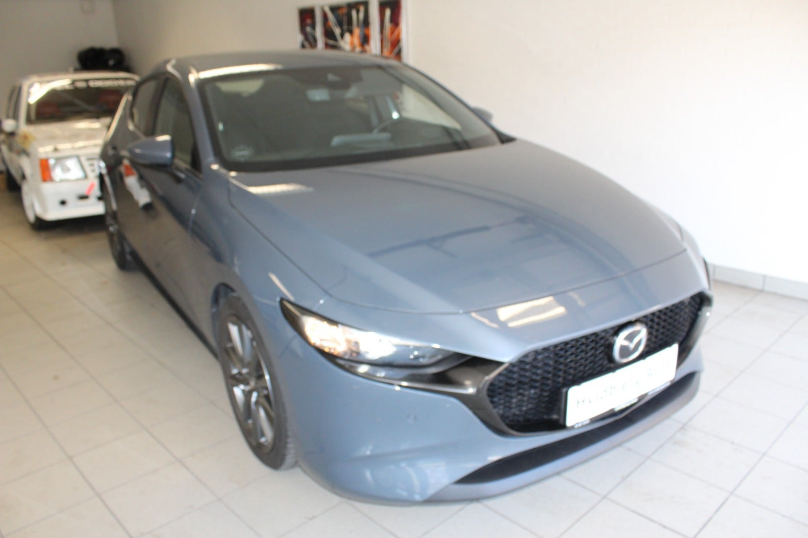 Grå Mazda 3 fra 2019