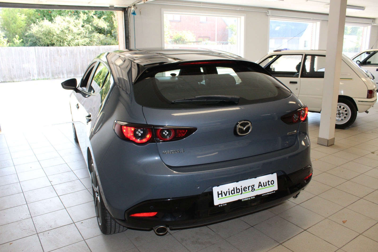 Grå Mazda 3 fra 2019