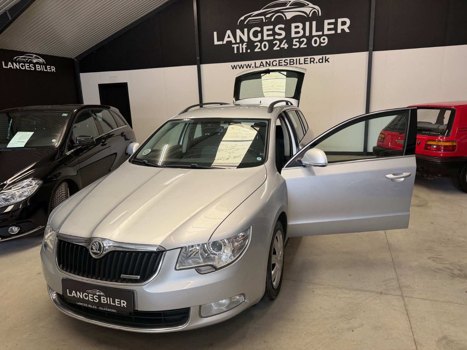 Sølv Skoda Superb fra 2012