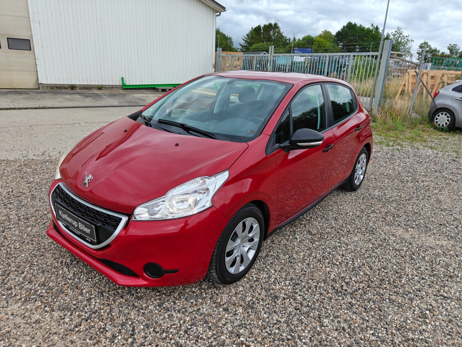 Gul Peugeot 208 fra 2014