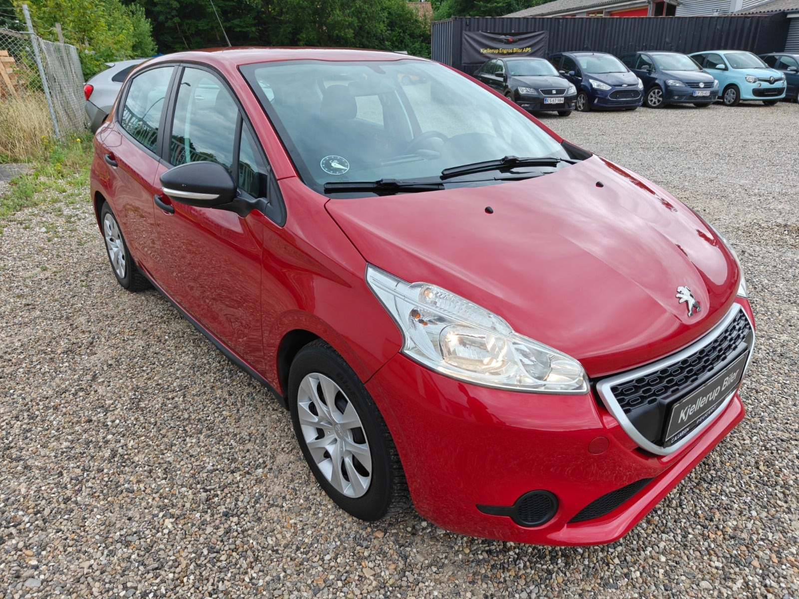 Gul Peugeot 208 fra 2014