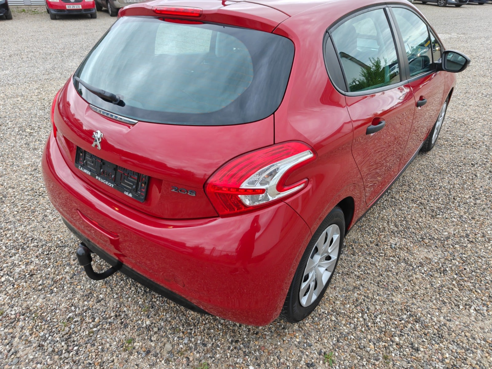 Gul Peugeot 208 fra 2014