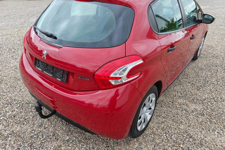 Gul Peugeot 208 fra 2014