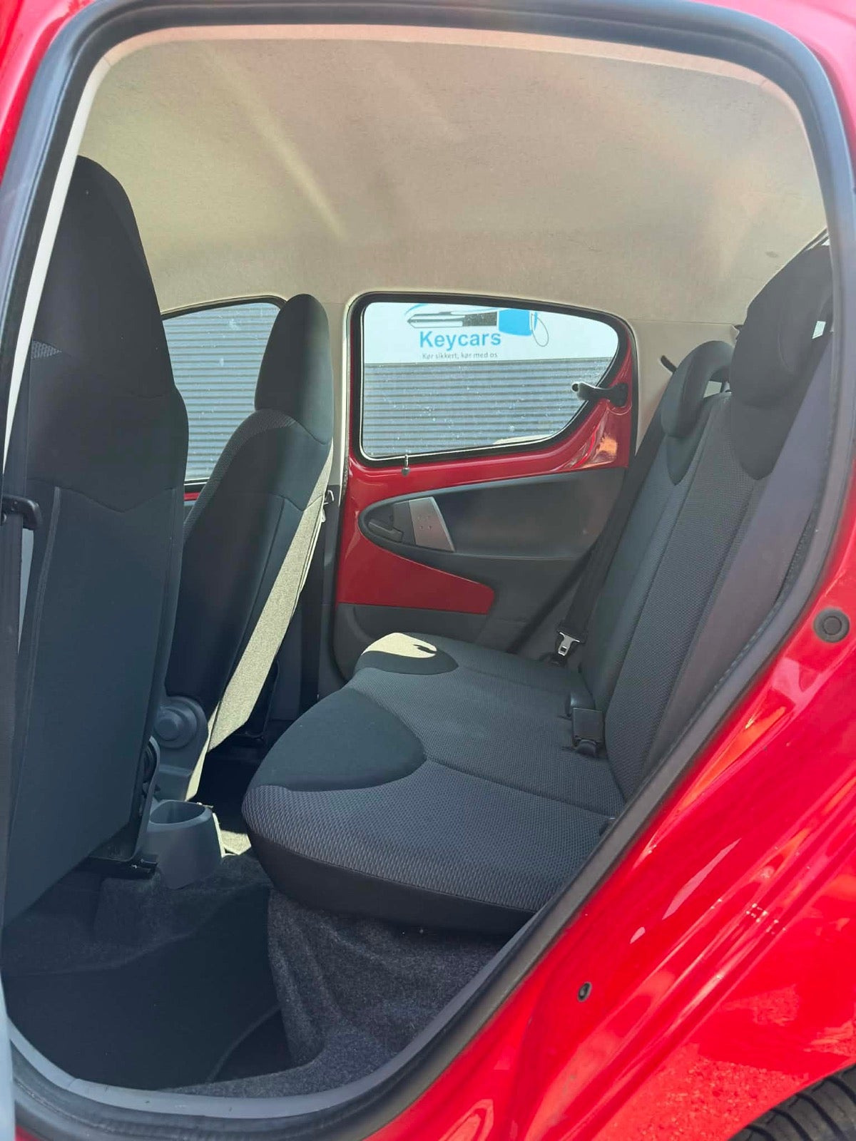 Rød Toyota Aygo fra 2006
